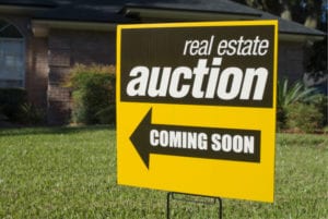 Foreclosed homes are often sold through an auction process